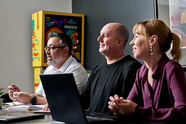 Rob and team in boardroom